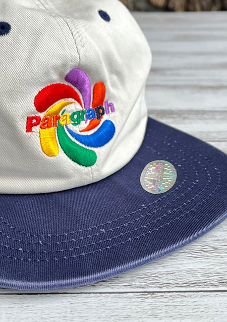 PARAGRAPH CAP | IVORY/NAVY