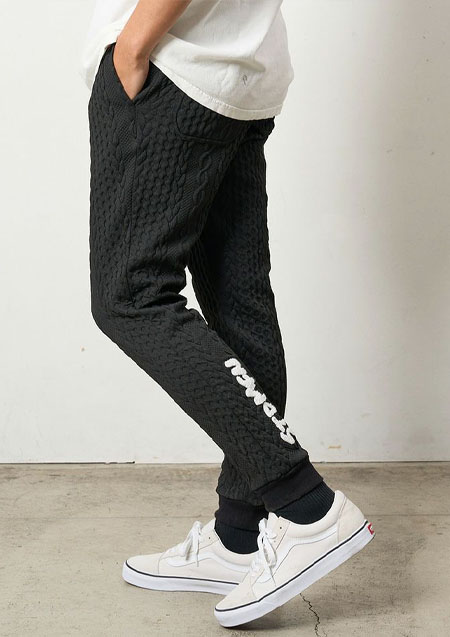 STUD MUFFIN ケーブルジャガードダブルフェイス サガラ刺繍リブパンツ | BLACK