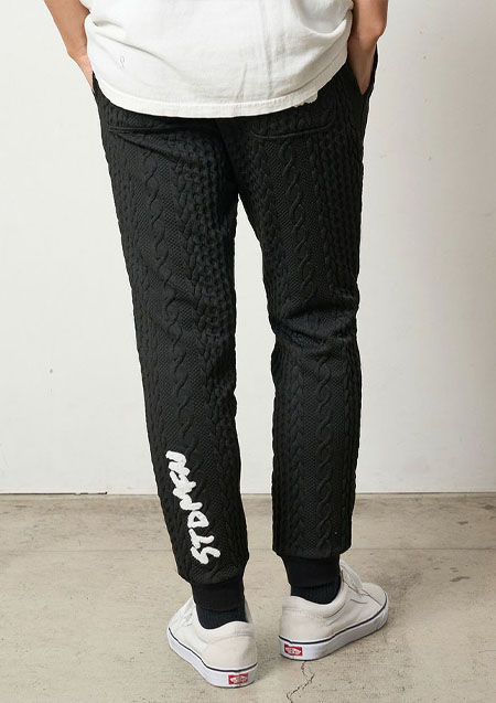 STUD MUFFIN ケーブルジャガードダブルフェイス サガラ刺繍リブパンツ | BLACK